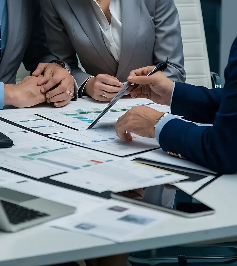 Financial advisors presenting tailored debt and alternative funding solutions to clients, aligning with cash flow and long-term goals.